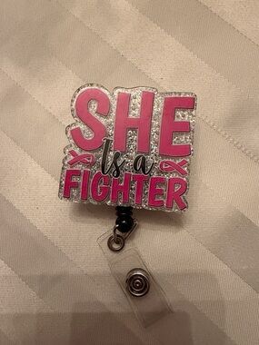 Pink "She Is A Fighter" Badge Reel